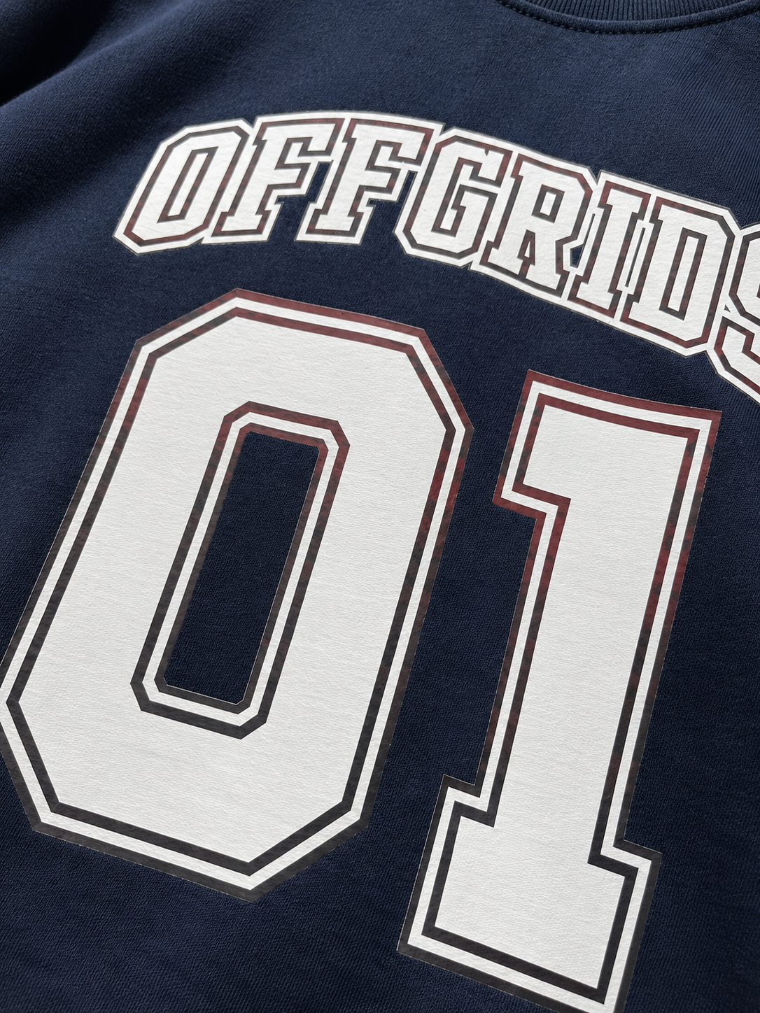 OFFGRIDS 01 Limited Edition Graphic T-Shirt – Navy Blue  Description
